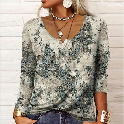 T-shirt à manches longues pour femme, à col en U et motif floral géométrique.
